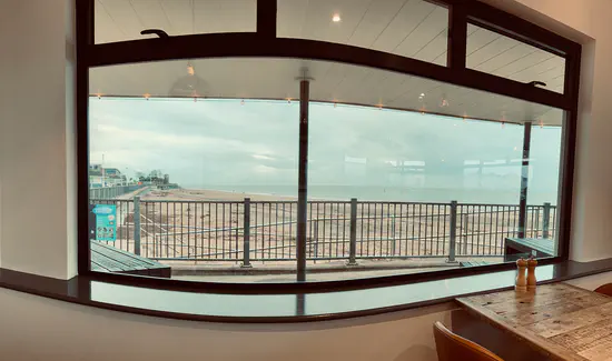 A photograph of the view of Exmouth beach from inside The Octagon.